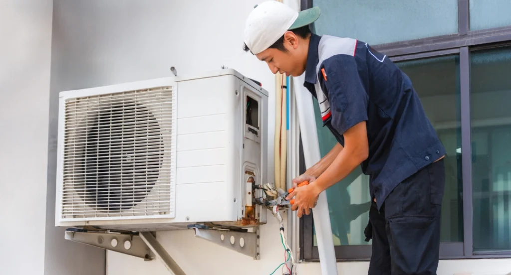Expert AC technician performing diagnostics and service for reliable, cheap ac repair katy tx.