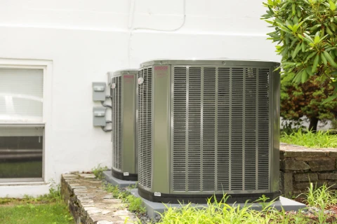 Modern HVAC units outside home for free service call ac repair katy tx with efficient cooling system installation.