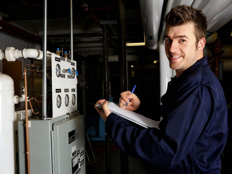 Technician performing detailed HVAC inspection for same day AC repair Katy TX