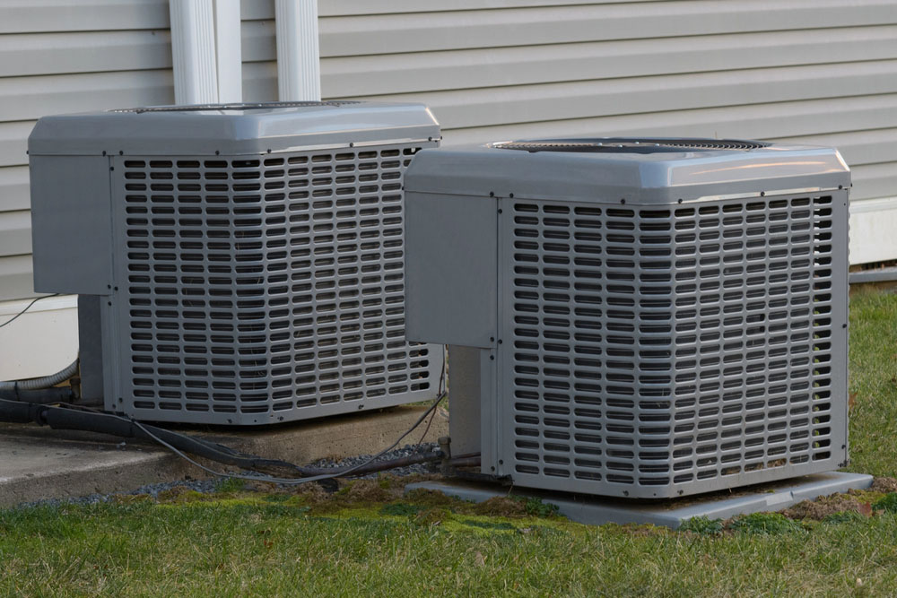 Modern outdoor AC units ready for professional installation or repair with financing available in Katy TX
