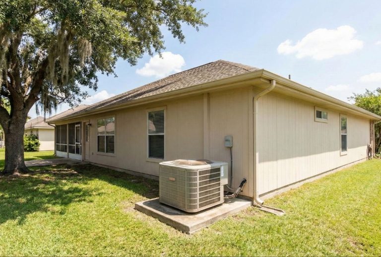 ac not cooling repair katy tx residential HVAC system setup with outdoor unit beside single-story home