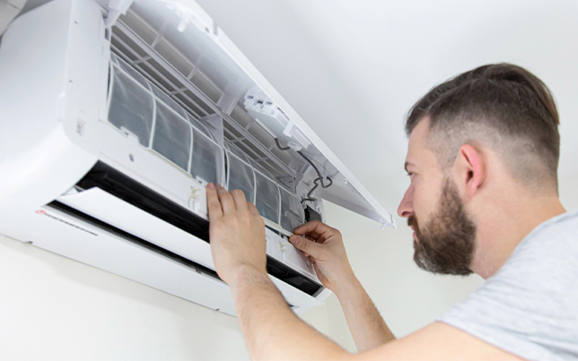 Local technician performing an ac installation fulshear tx while ensuring peak indoor air quality for the home.