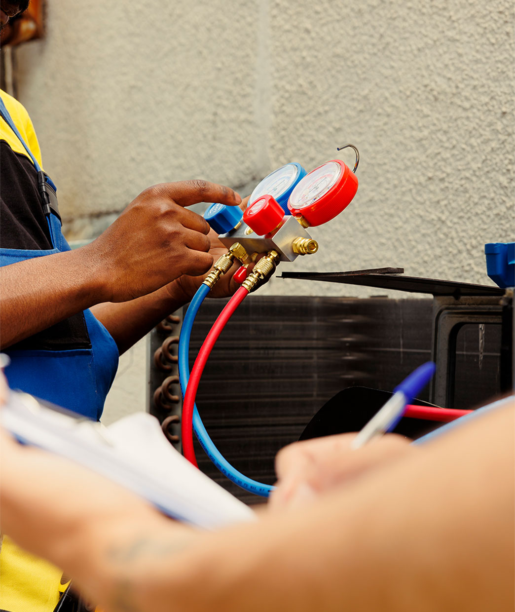 Expert technician performing a precise ac installation fulshear tx by checking system pressure with pro gauges.