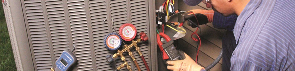 Local specialist providing a thorough ac maintenance fulshear tx by inspecting the outdoor condenser unit parts.