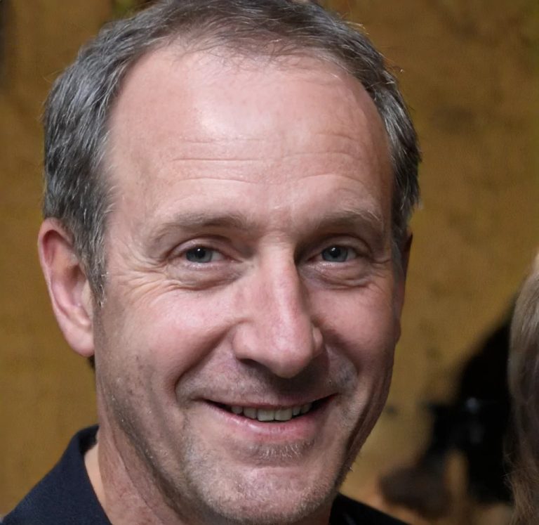 Headshot of a smiling middle-aged male homeowner who is one of many happy Rheem AC repair Katy TX Clients online.
