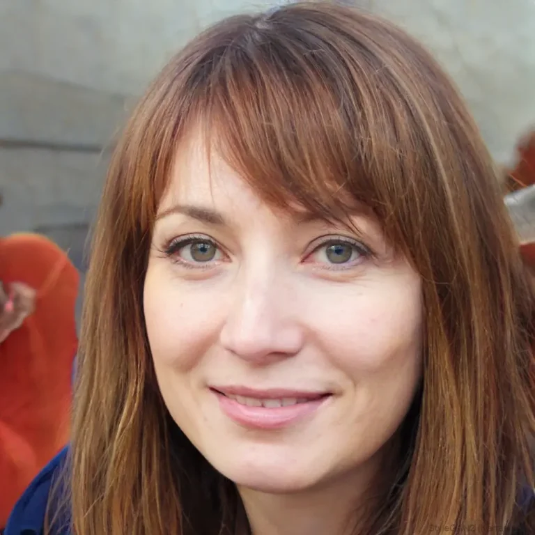 Headshot of a smiling auburn-haired woman recommending top HVAC services as a Lennox AC repair Katy TX Client.